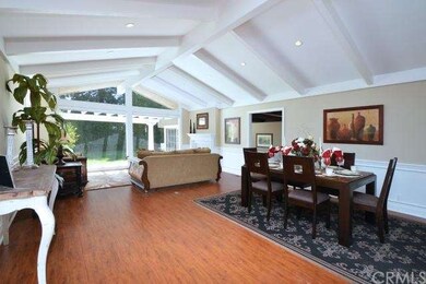 Spacious living room with large picture windows lo