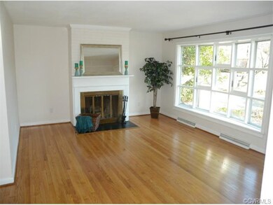 Lovely Living Room with a gleaming hardwood floor,