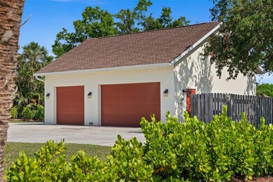 3 car detached garage with loft on top.
