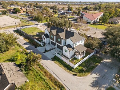 This stunning, modern duplex, built in 2023, offer
