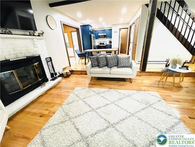 Open concept living room, to dinning and kitchen