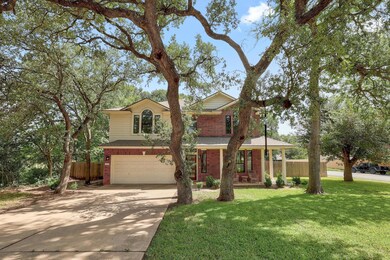 View of front facade featuring brick siding, an a