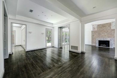 Incredible dining space with shelved ceilings. Easily accessible to the kitchen and den.
