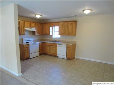 View of Kitchen, notice the lighting