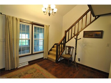 The front porch leads to the entry door and welcom