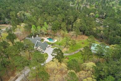 3 car garage Pool, spa and waterfalls plus separate firepit area and FABULOUS outdoor kitchen area! Water Well for irrigation and Pool!!