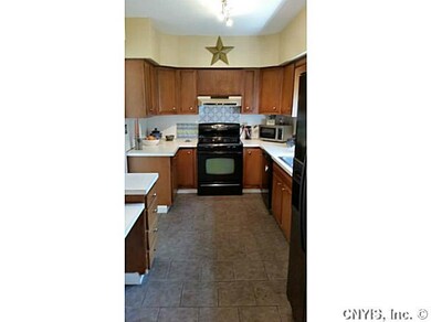 Kitchen. Newer appliances and tiled floor in the k