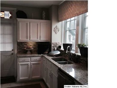 Granite Counters.  Balcony Out Back