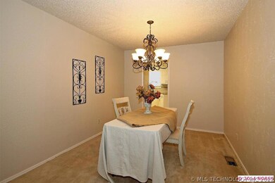Formal dining room with oil rubbed bronzed chandel