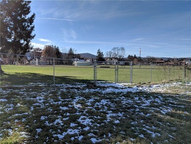 Backyard with Gated Access through to Marcus Park. This property has a deeded easement to use the gate from the City.