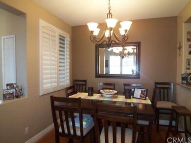 Notice the wood flooring, upgraded baseboards, war