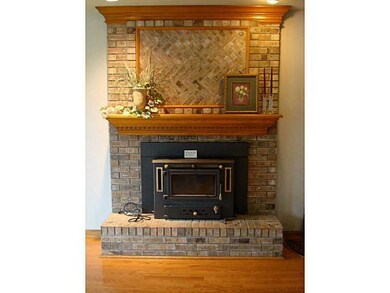 Family Room. Wood burner insert can be removed.