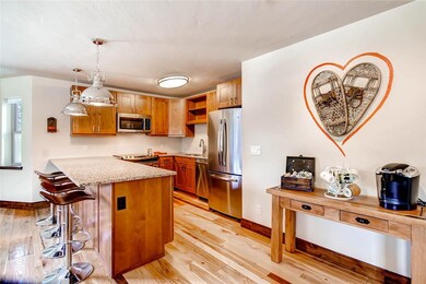 Kitchen is outfitted with Granite Slab Countertops