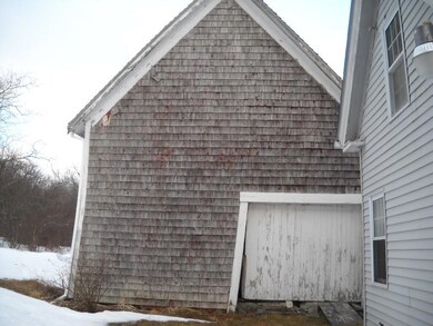 Side of house with barn