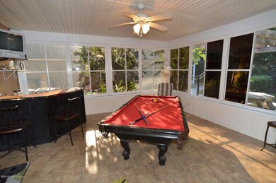 Enclosed Patio with Pool Table and Bar