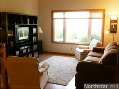 Living Room - Natural sunlight, wood flrs, vaulted