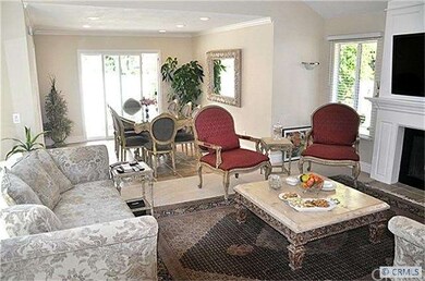 Living room with high ceilings and Fireplace