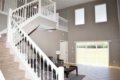 View from the entry foyer soaring ceilings! grand 