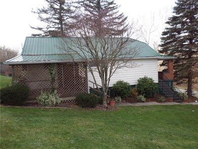 Rear covered back porch, a perfect place to enjoy 