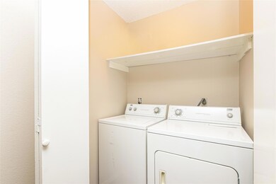 Laundry room featuring washing machine and dryer