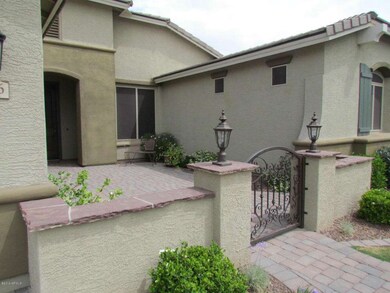 Gated pavered front courtyard!