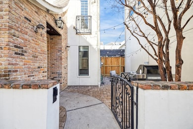 Gated entryway and large outdoor patio