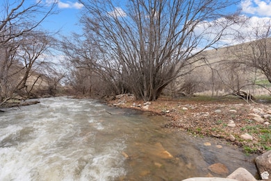 View of yard featuring a water view