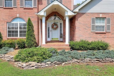 Well manicured garden beds add beauty to this immaculate home, which is located on a quiet dead-end street.