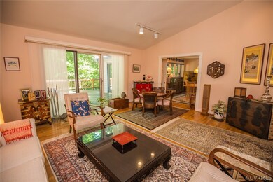 Living room is filled with light from the sliding