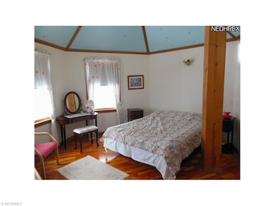 Romantic Bedroom featuring 6 point ceiling and Har