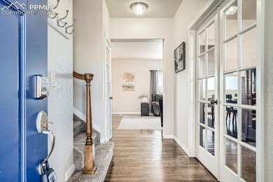 Real wood floors and office with french doors at t