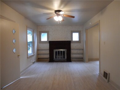 Living room with ornamental fireplace