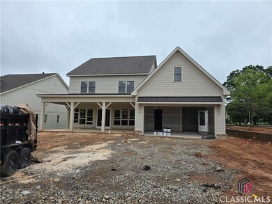 Rear of home with porch in progress