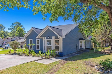 View of front of house with a front yard