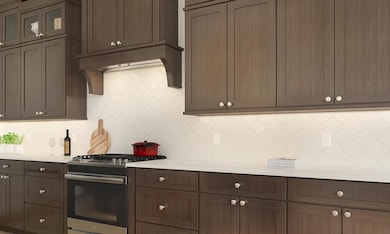 Kitchen with decorative tile backsplash