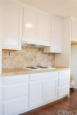 Built in new counter top range and exhaust fan.  
