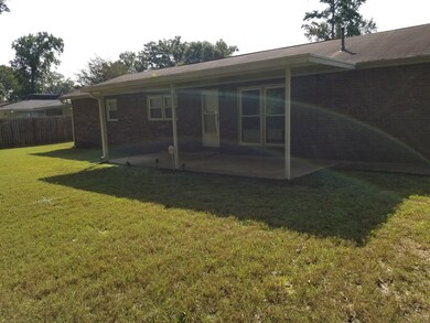 fenced back yard / covered porch