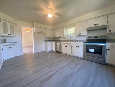 Kitchen includes Brand New Stove, Dishwasher, Sink