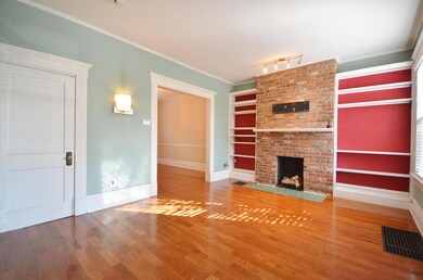 Living Rm w/custom built-in & fireplace