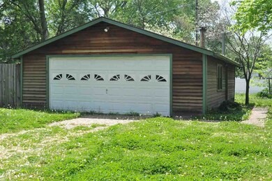 ....the garage offers plenty of shop and storage s