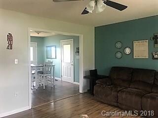 living room opens to dining area