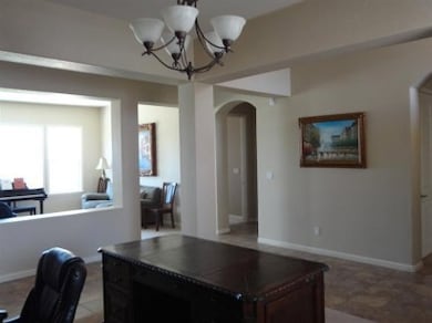 Arched doorways and 18X18 inch ceramic floor tiles in all the right places. 10ft Ceilings accented by 8ft doors off set by the tray ceilings give the interior an elegant open feel.