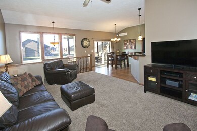 Open floor plan to the kitchen and dining room