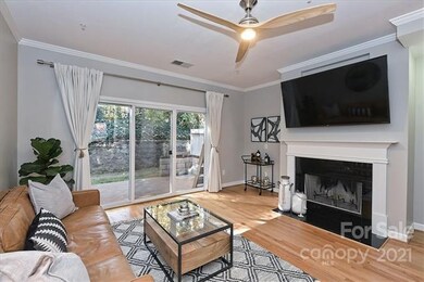 Living room with wood burning fireplace