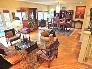 Living room looking toward French doors to patio