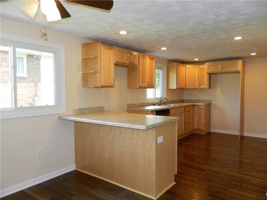 A new Aristokraft kitchen with maple soft close dr