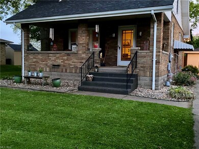 Front Porch & pretty lawn.