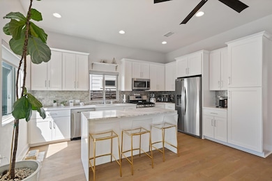 Kitchen featuring visible vents, a sink, a kitche