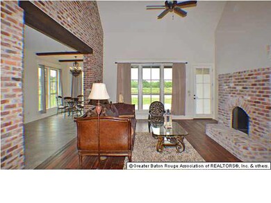 Spacious Den features Brick Fireplace, Fabulous 