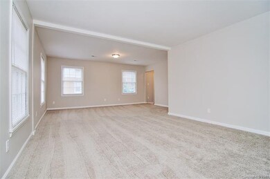 Large dining room with lots of natural light and n